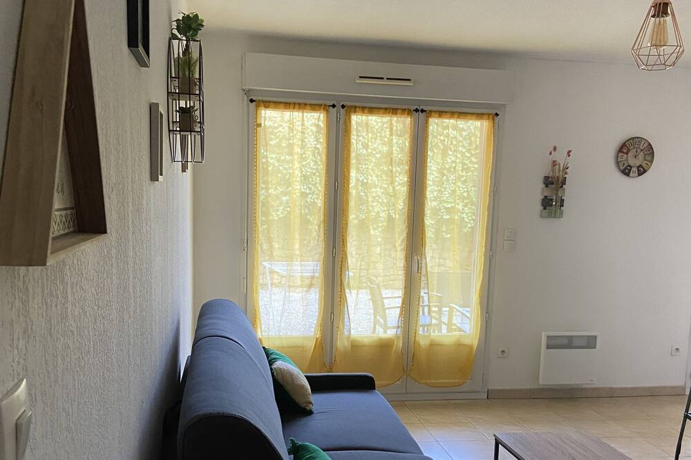 Photo of Livingroom in Millenaire