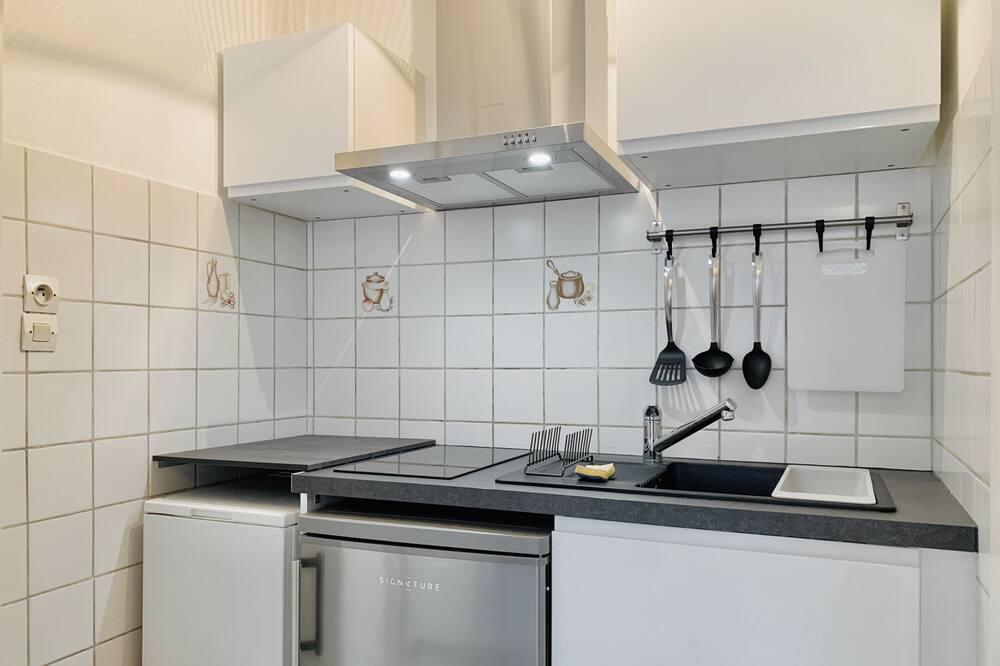 Photo of Kitchen in Quartier Exposition-Bajatiere