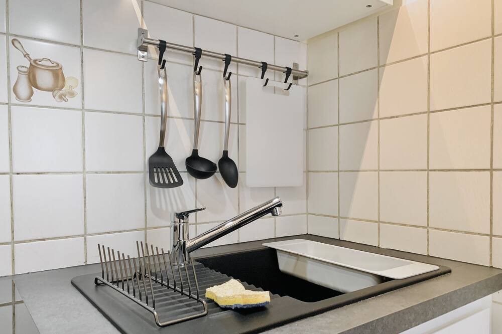 Photo of Kitchen in Quartier Exposition-Bajatiere