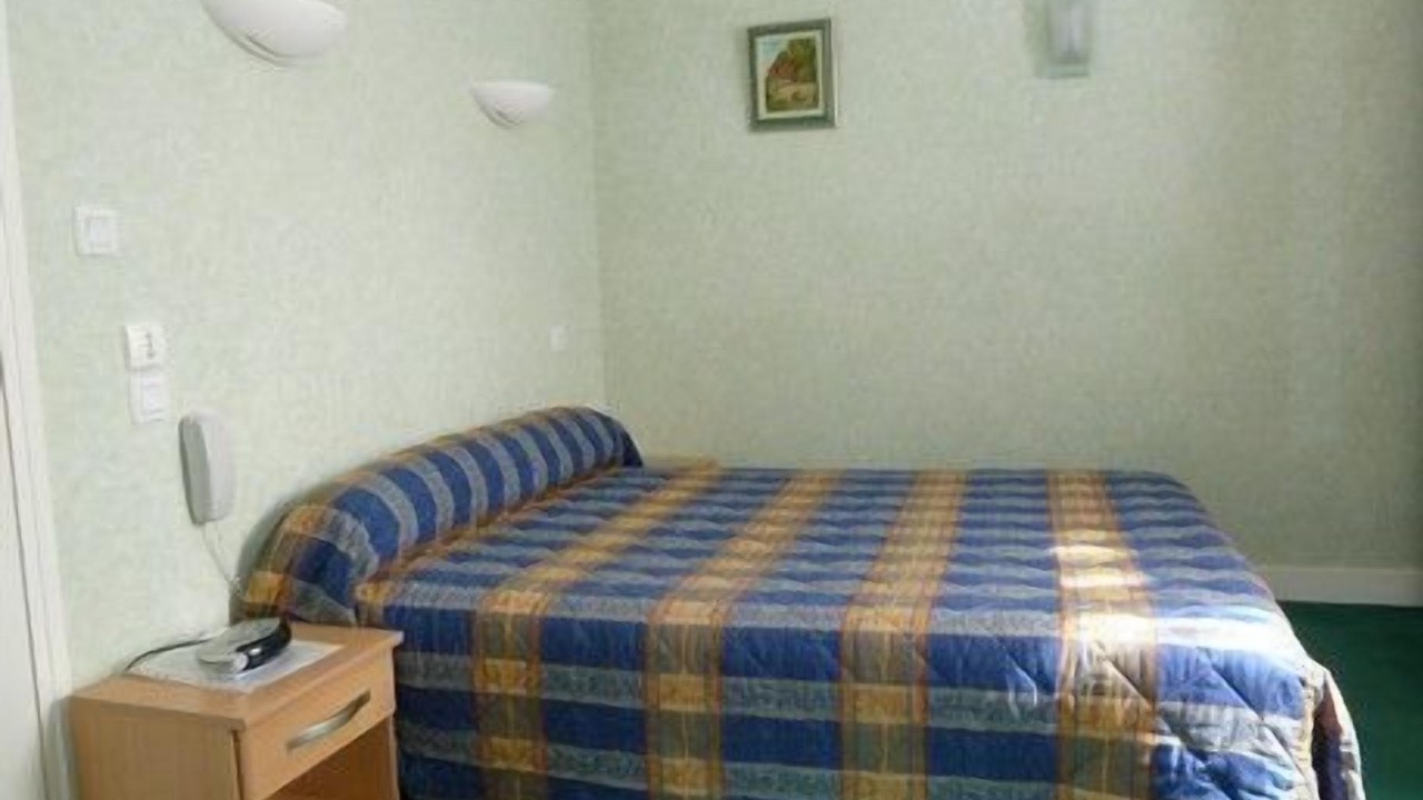 Photo of Bedroom in Pont-d'Ouilly