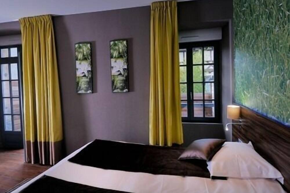 Photo of Bedroom in Beaulieu-sur-Dordogne