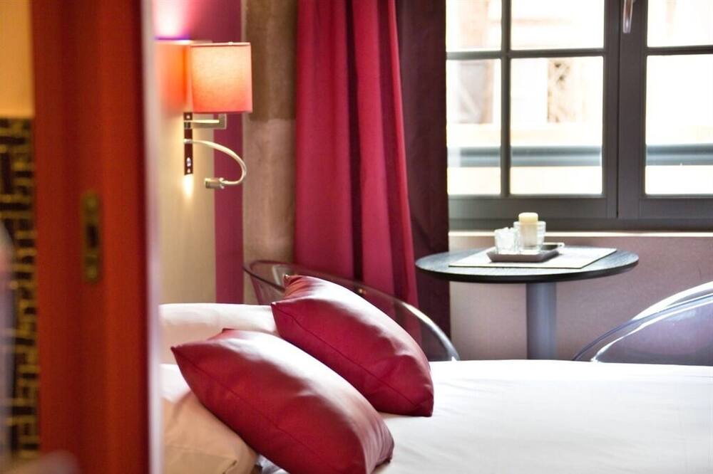 Photo of Bedroom in Beaulieu-sur-Dordogne