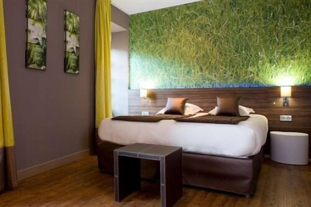 Photo of Bedroom in Beaulieu-sur-Dordogne