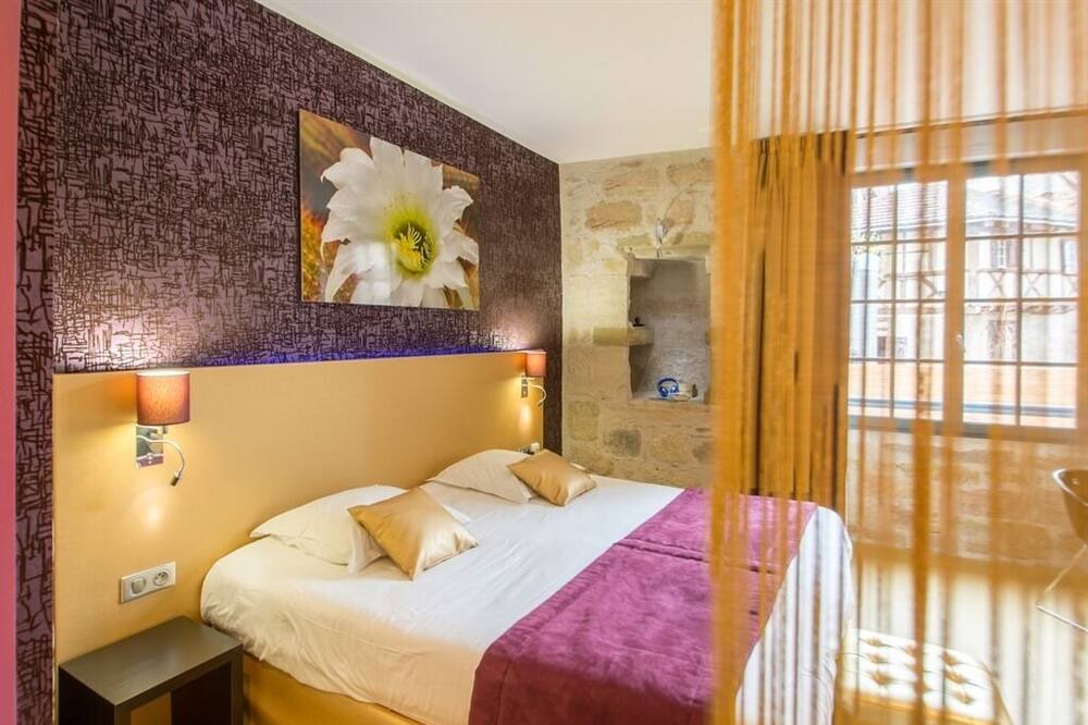 Photo of Bedroom in Beaulieu-sur-Dordogne