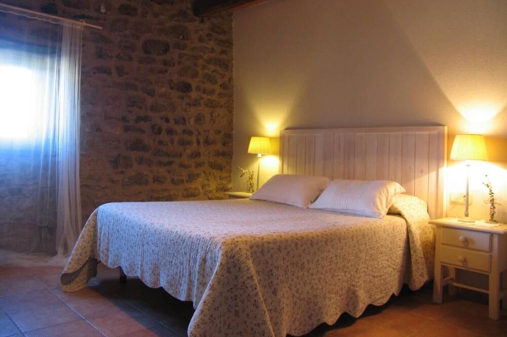Photo of Bedroom in Viver i Serrateix