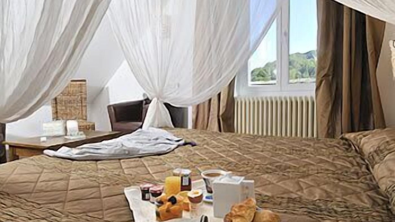 Photo of Bedroom in Beaulieu-sur-Dordogne