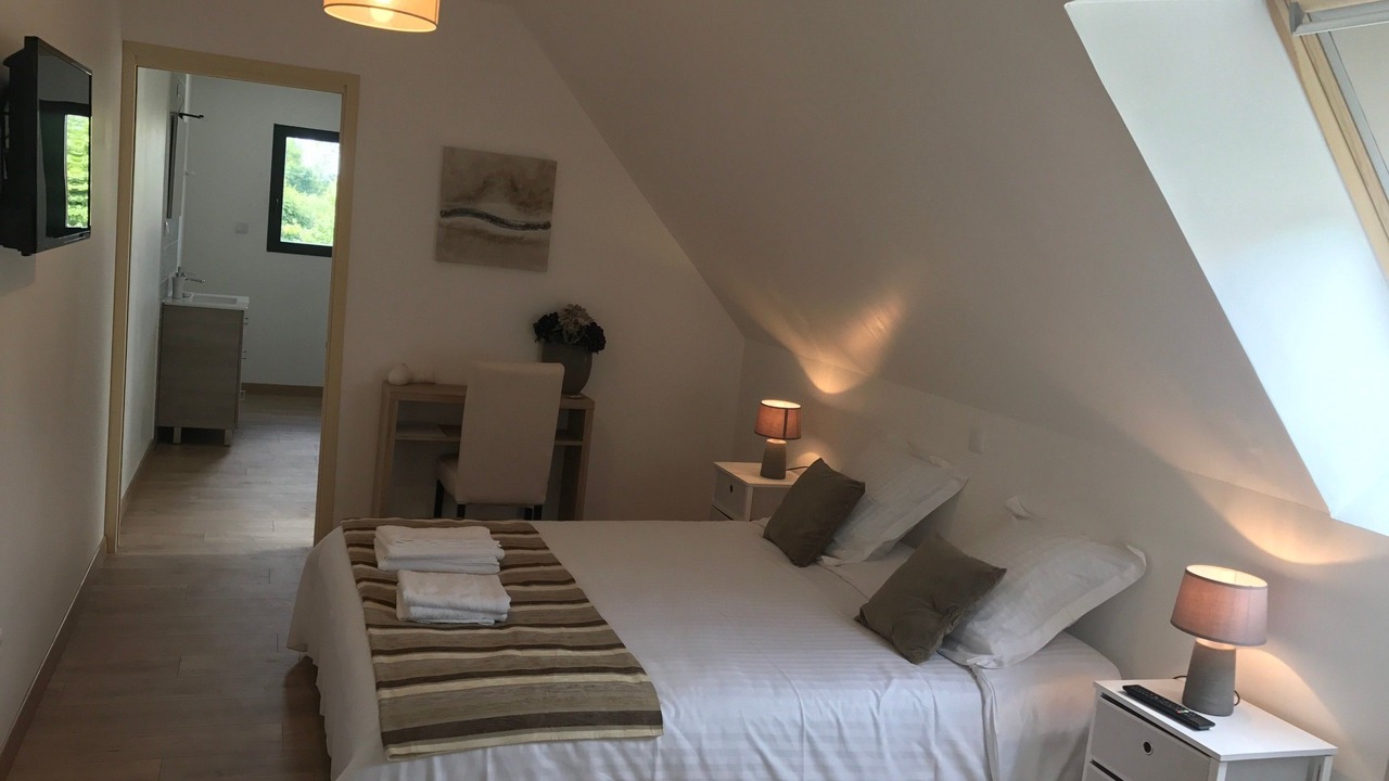 Photo of Bedroom in Saint-Quentin-en-Tourmont