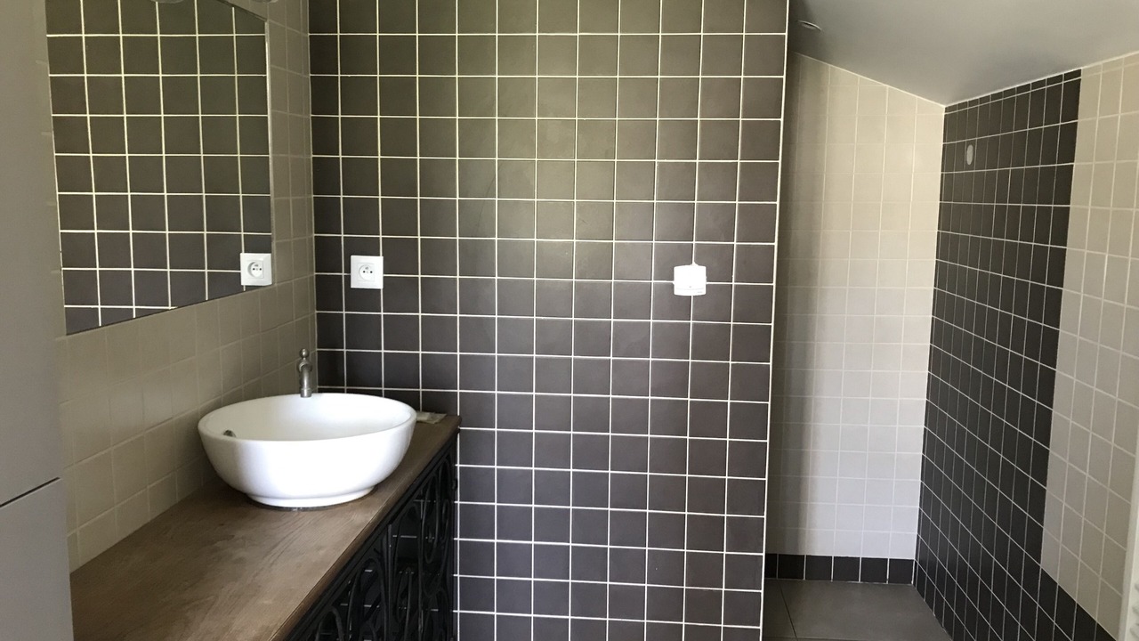 Photo of Bathroom in Saint-Quentin-en-Tourmont