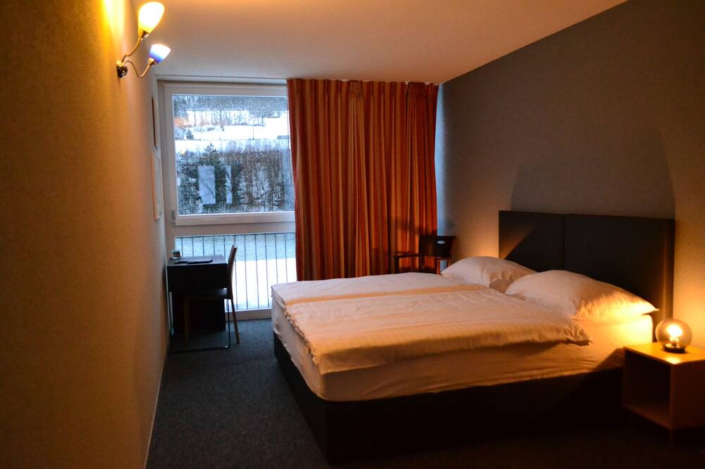 Photo of Bedroom in Les Brenets