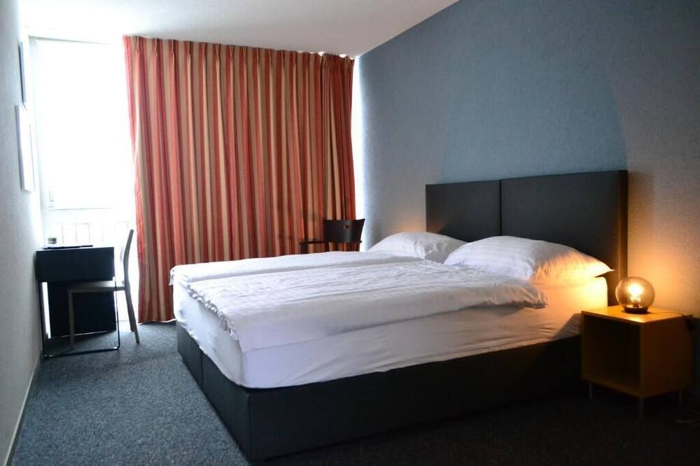 Photo of Bedroom in Les Brenets