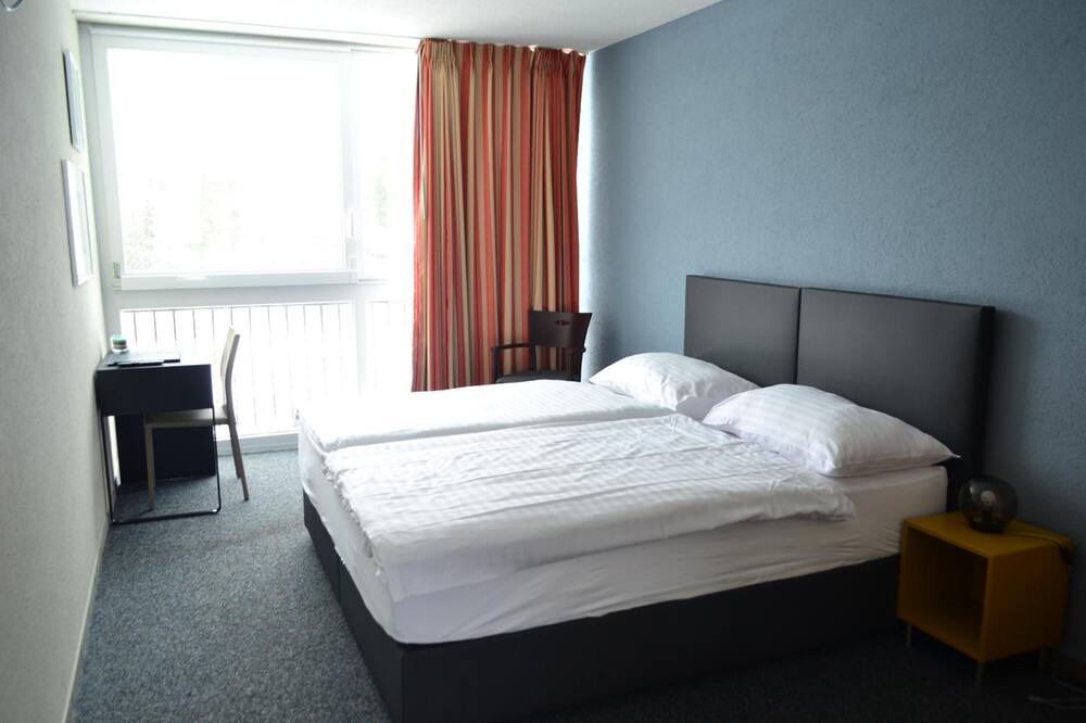 Photo of Bedroom in Les Brenets