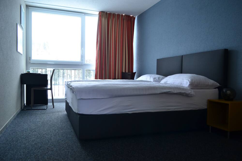 Photo of Bedroom in Les Brenets
