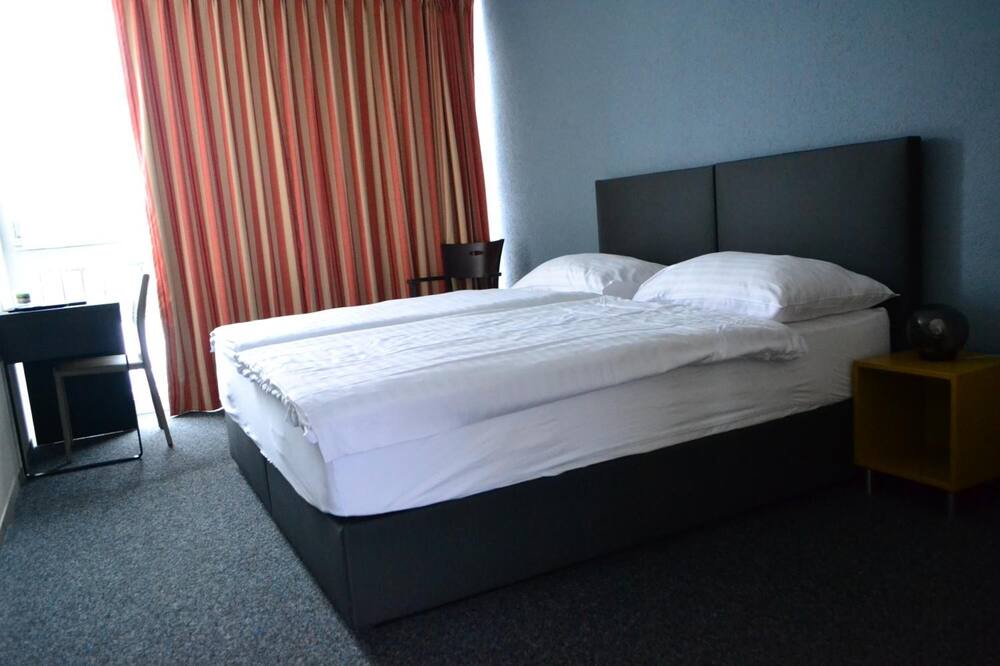Photo of Bedroom in Les Brenets
