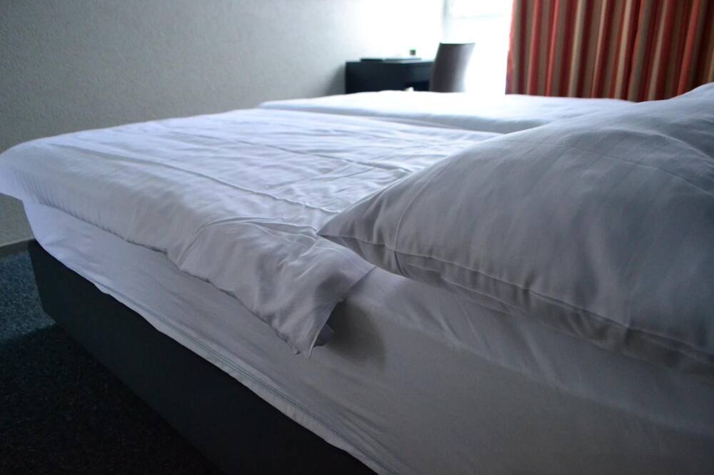 Photo of Bedroom in Les Brenets