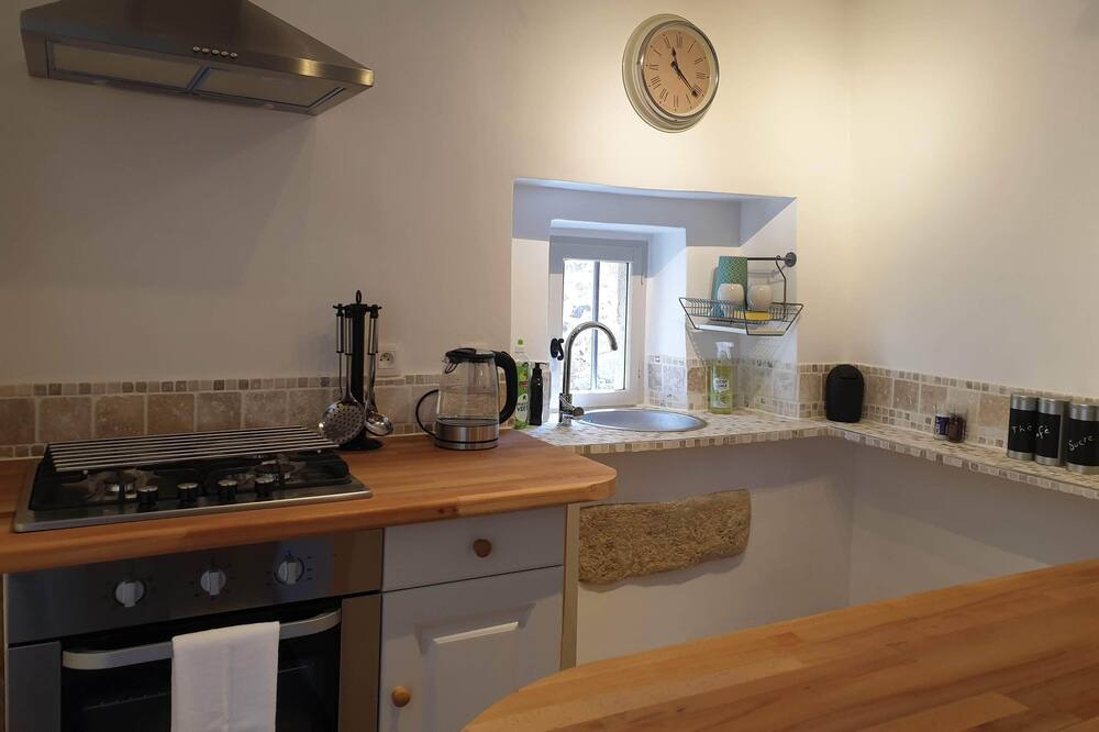 Photo of Kitchen in Egliseneuve-des-Liards