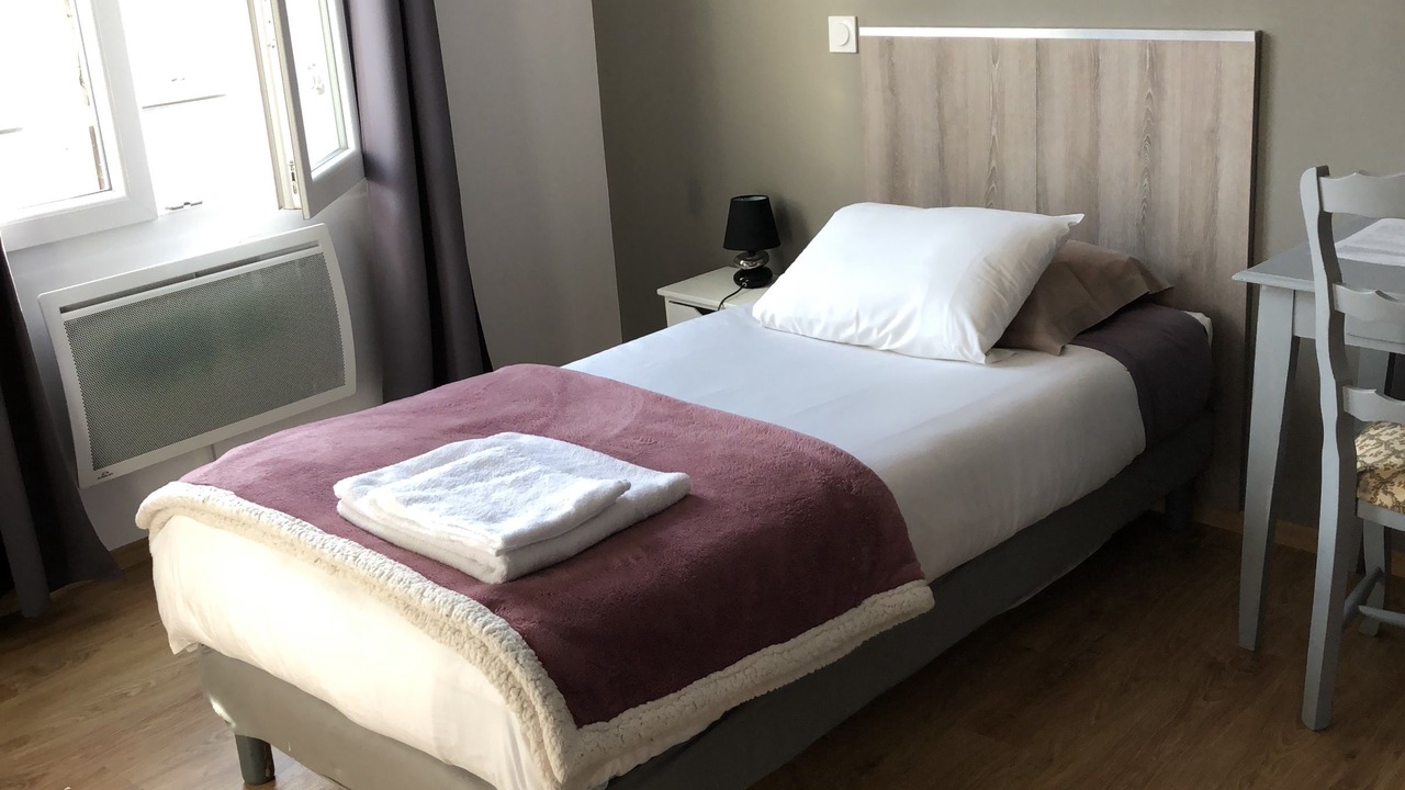 Photo of Bedroom in Saint-Amand-Montrond