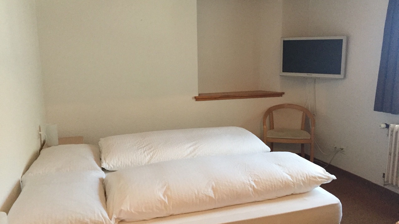 Photo of Bedroom in Santa Maria Val Muestair