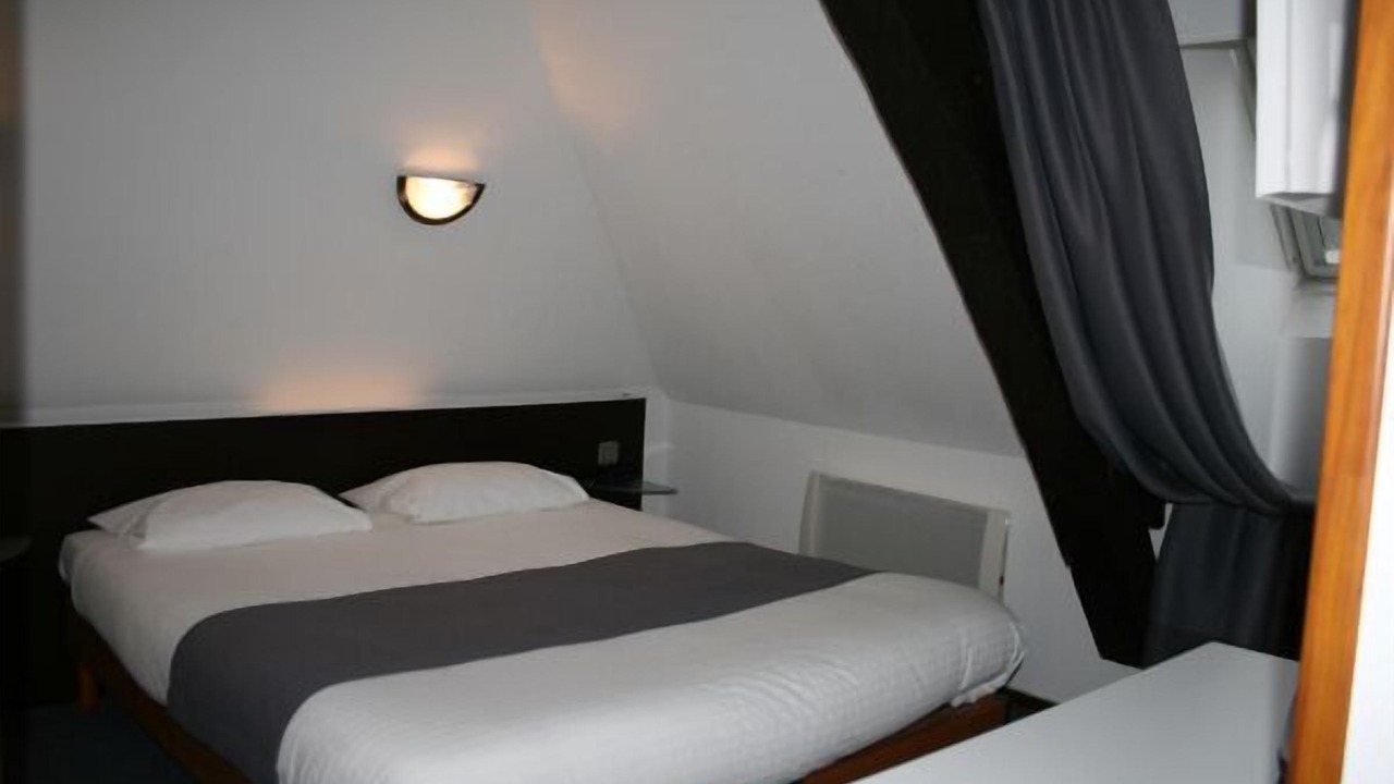 Photo of Bedroom in Saint-Bonnet-Troncais