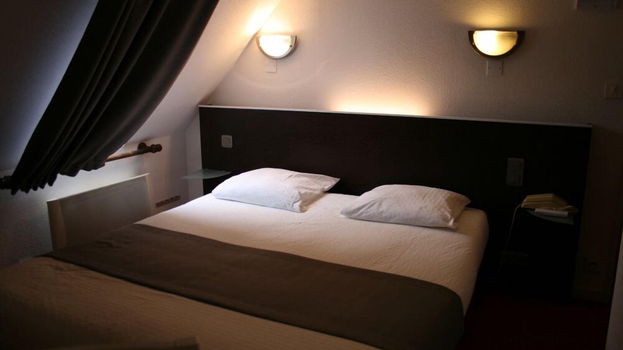 Photo of Bedroom in Saint-Bonnet-Troncais