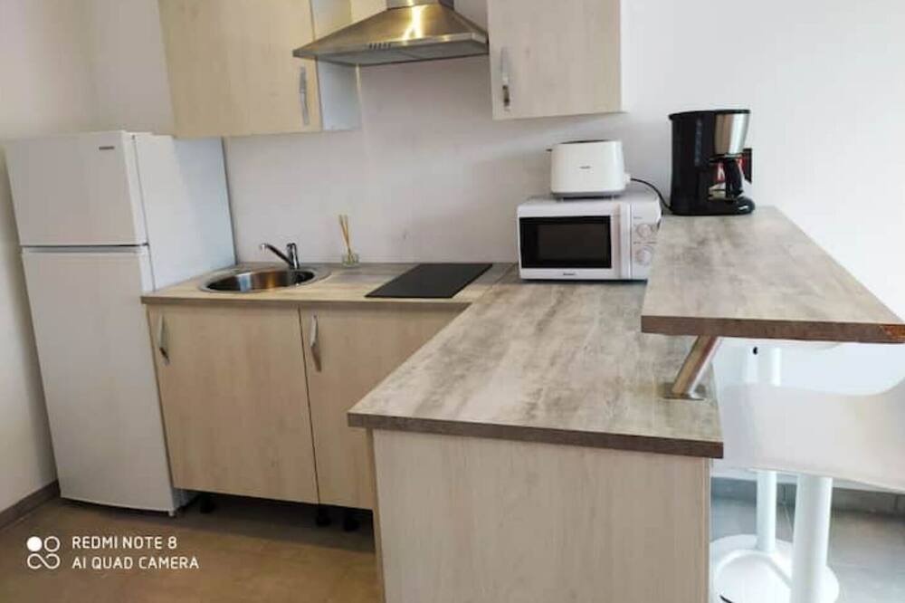 Photo of Kitchen in Enveitg