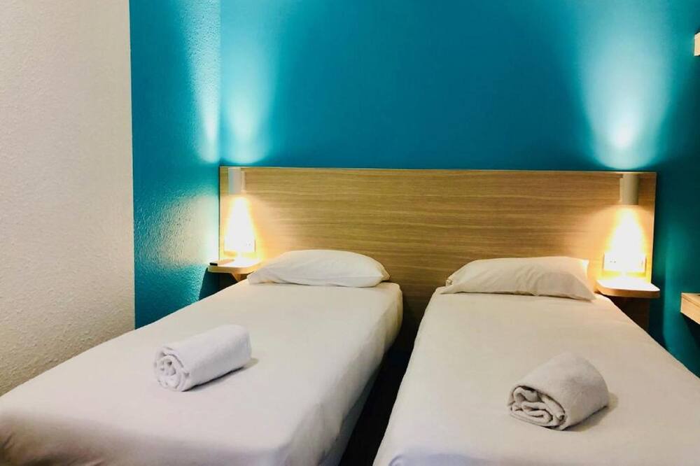 Photo of Bedroom in Hotel-de-Ville