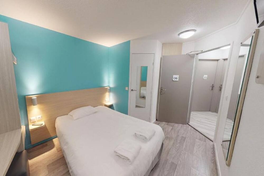 Photo of Bedroom in Hotel-de-Ville
