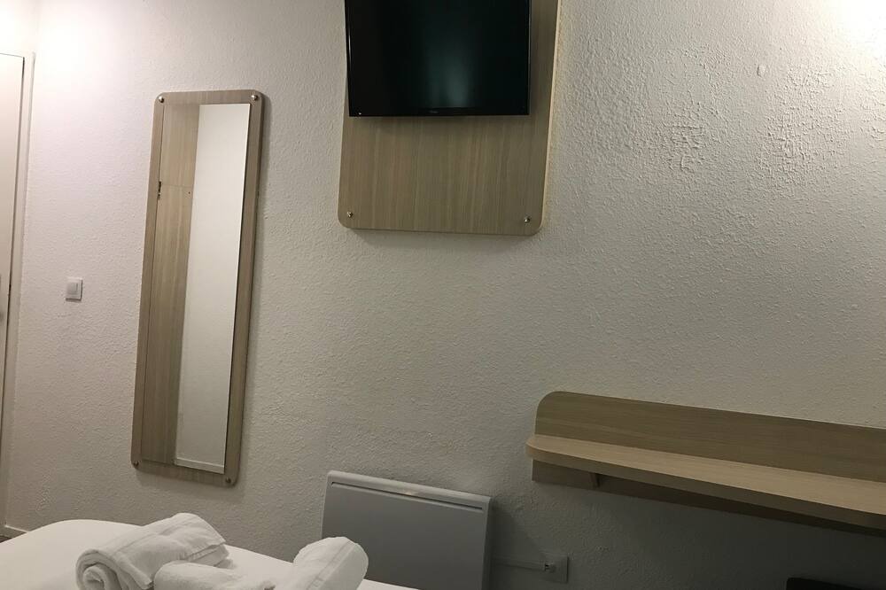 Photo of Bedroom in Hotel-de-Ville