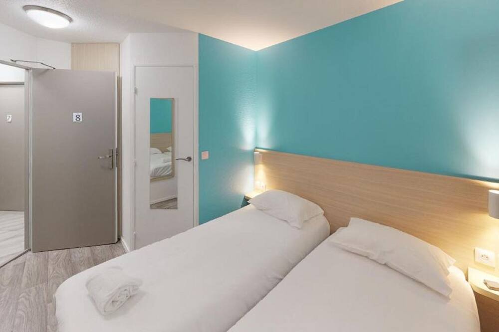 Photo of Bedroom in Hotel-de-Ville