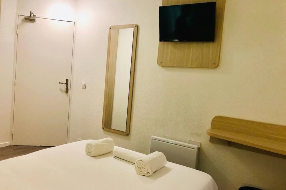 Photo of Bedroom in Hotel-de-Ville