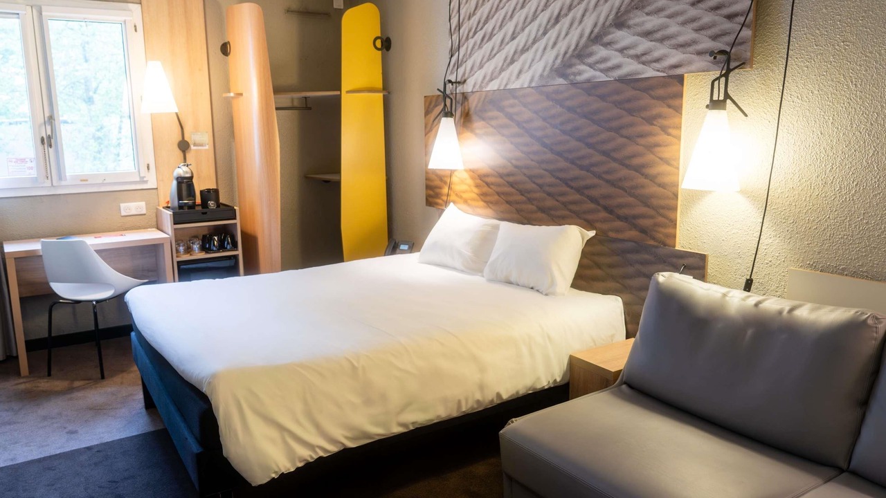 Photo of Bedroom in Royallieu Pompidou