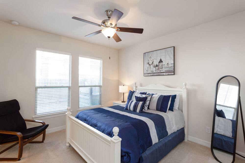 Photo of Bedroom in Spring Shadows