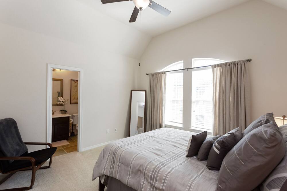 Photo of Bedroom in Spring Shadows