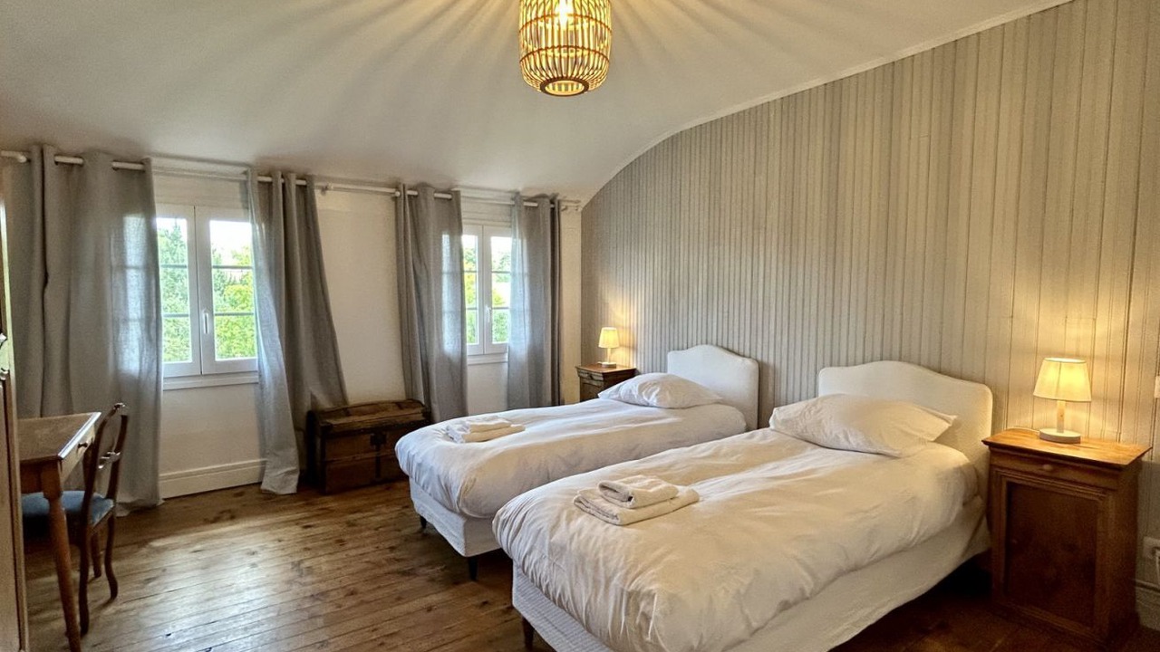 Photo of Bedroom in Saint-Quentin-en-Tourmont
