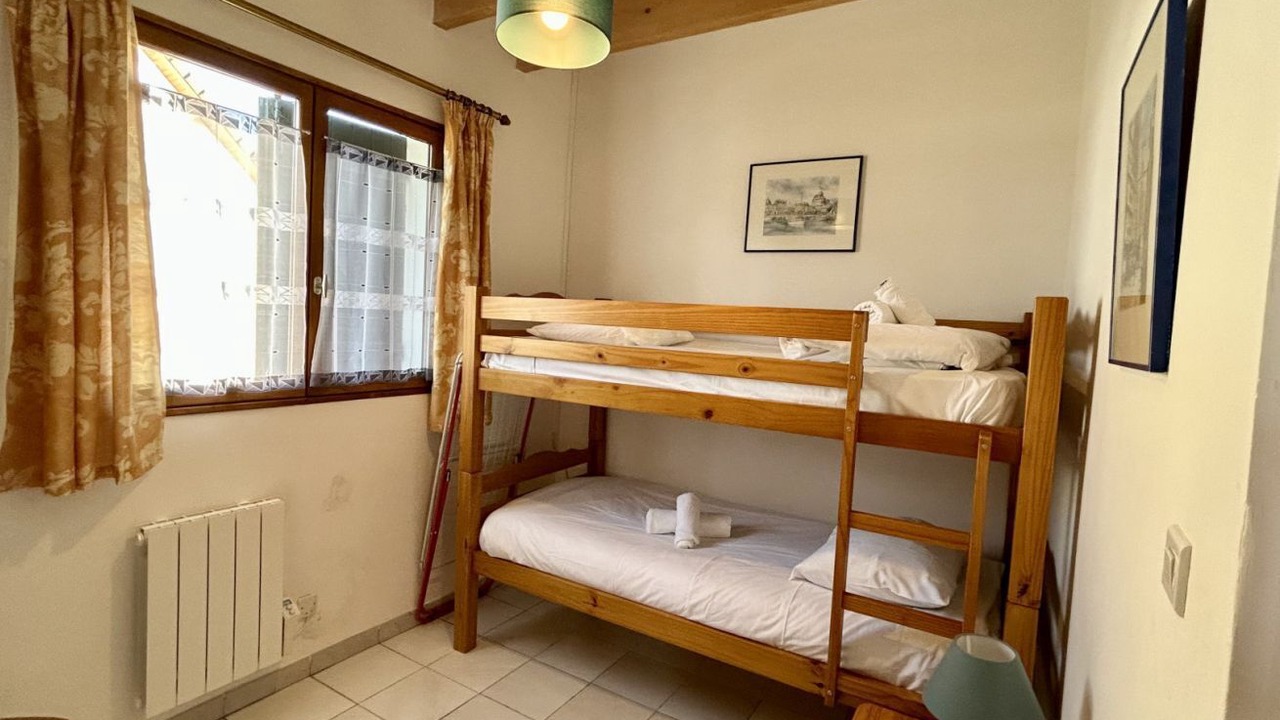 Photo of Bedroom in Saint-Quentin-en-Tourmont