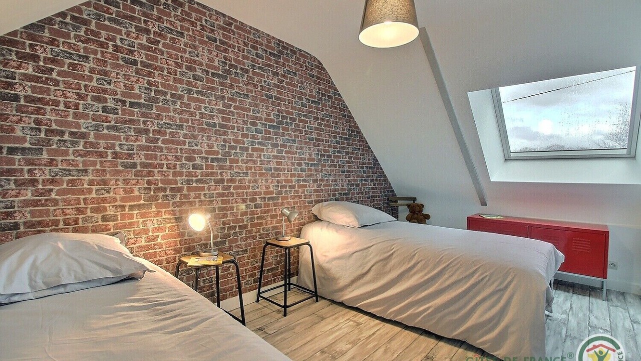 Photo of Bedroom in Saint-Jean-Kerdaniel