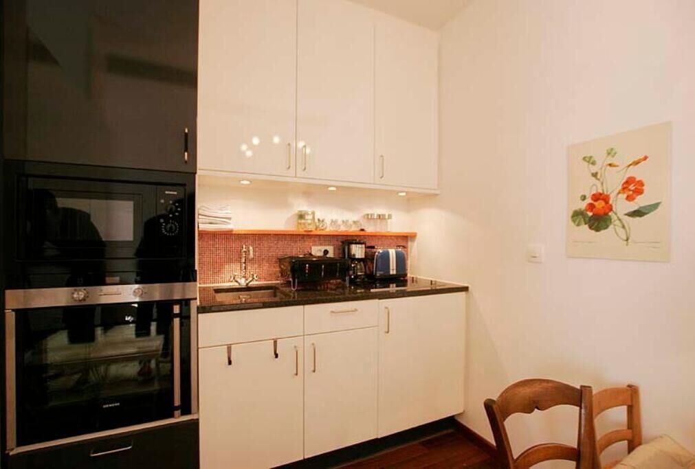 Photo of Kitchen in Quartier de la Monnaie