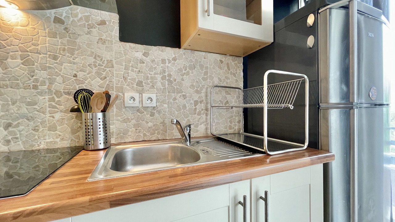 Photo of Kitchen in Quartier Exposition-Bajatiere