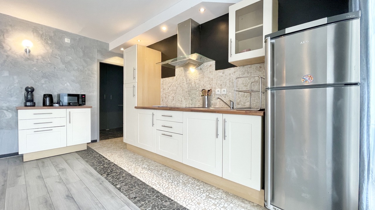 Photo of Kitchen in Quartier Exposition-Bajatiere