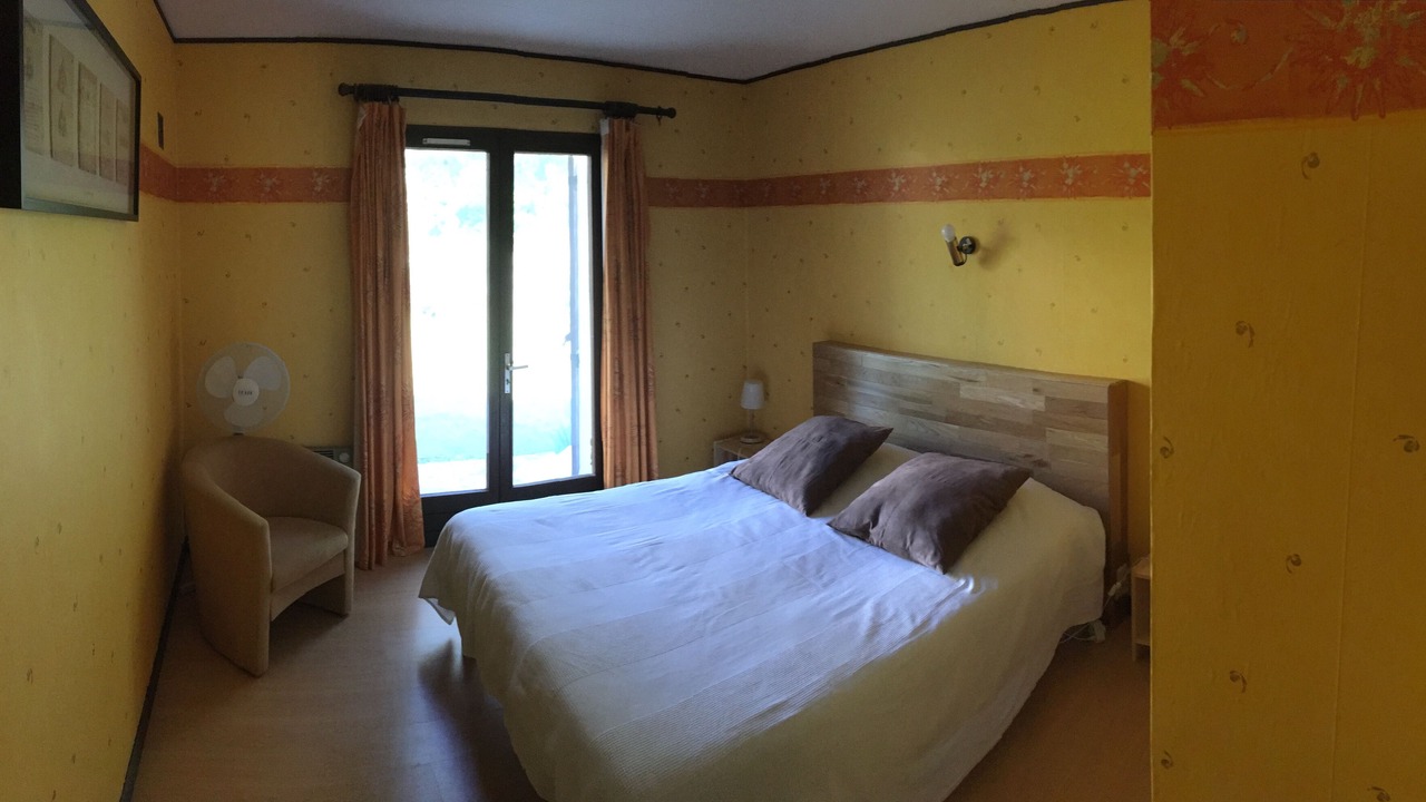 Photo of Bedroom in Saint-Julien-de-Peyrolas