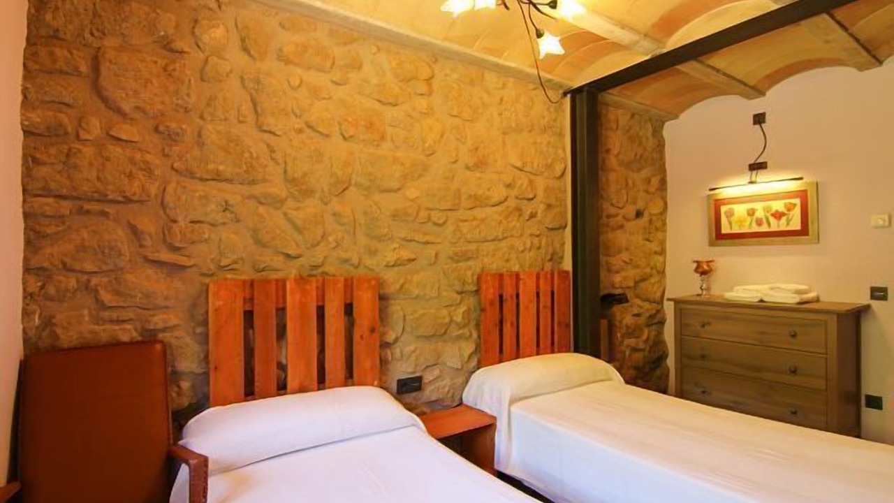 Photo of Bedroom in Viver i Serrateix