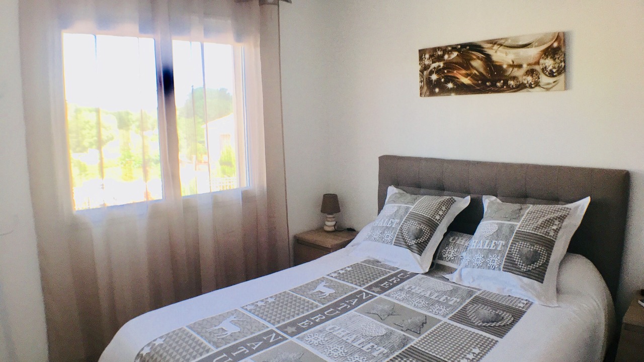 Photo of Bedroom in Saint-Julien-les-Rosiers
