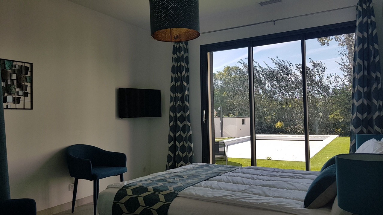 Photo of Bedroom in Saint-Julien-de-Peyrolas