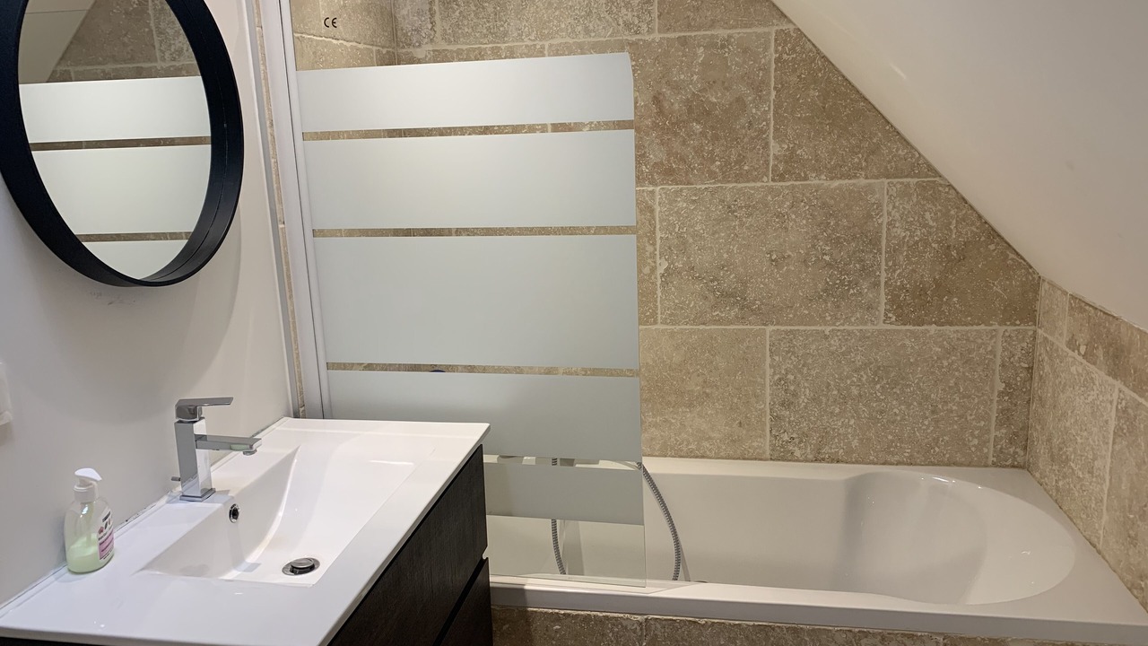 Photo of Bathroom in Saint-Quentin-en-Tourmont