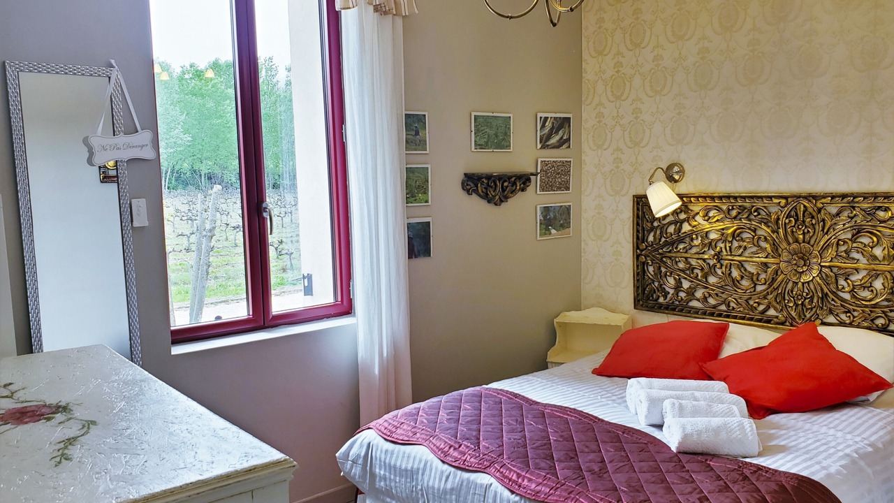 Photo of Bedroom in Saint-Julien-de-Peyrolas