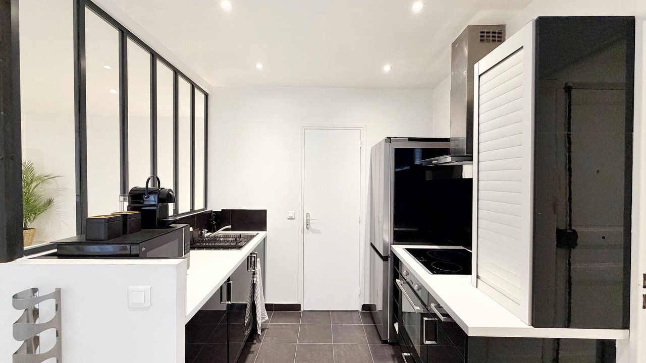 Photo of Kitchen in Quartier de la Folie-Mericourt