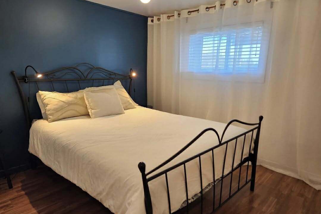 Photo of Bedroom in La Malbaie