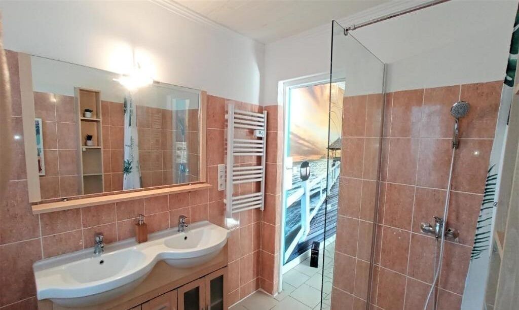 Photo of Bathroom in Saint-Julien-les-Rosiers