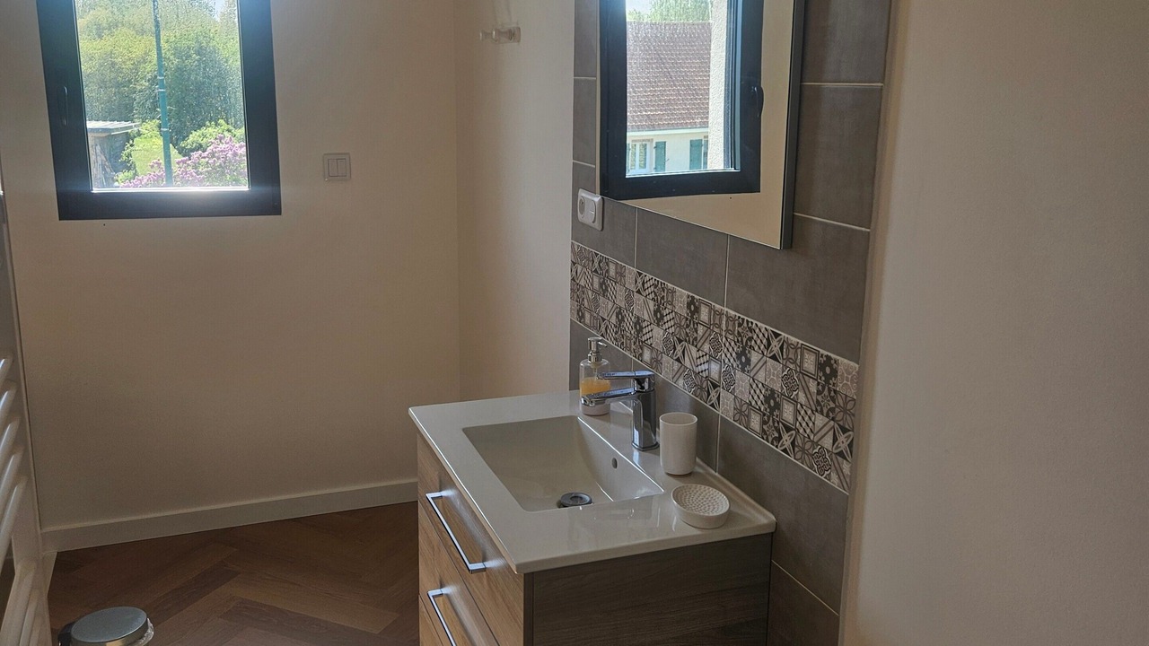 Photo of Bathroom in Saint-Quentin-en-Tourmont