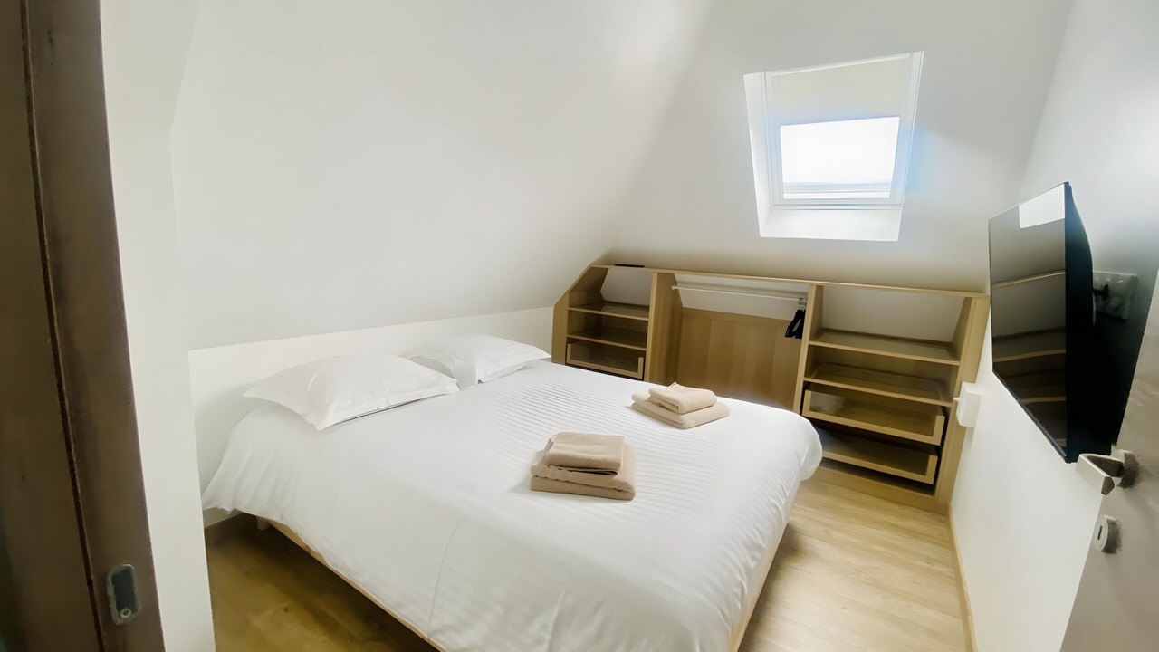 Photo of Bedroom in Saint-Quentin-en-Tourmont