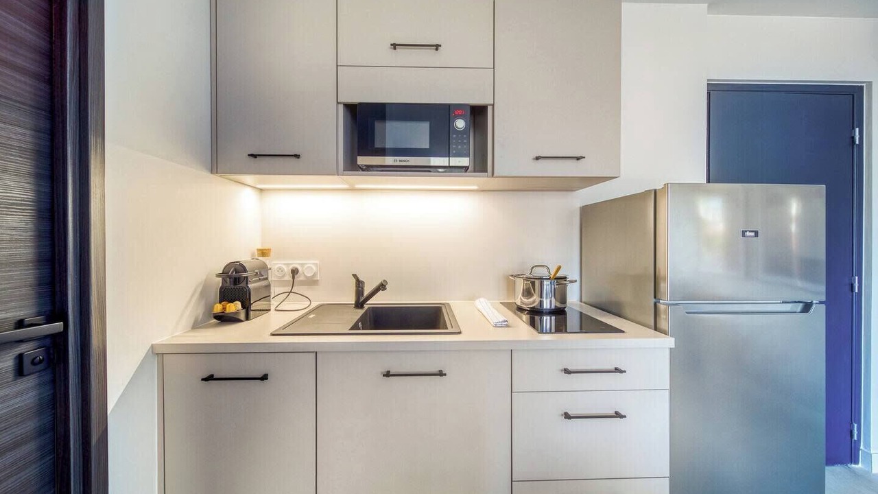 Photo of Kitchen in Quartier Exposition-Bajatiere